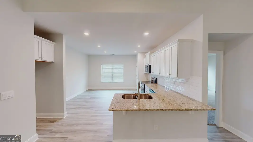 Furnished interior view inside a new home in Holliday Pass, Griffin (Image 3).