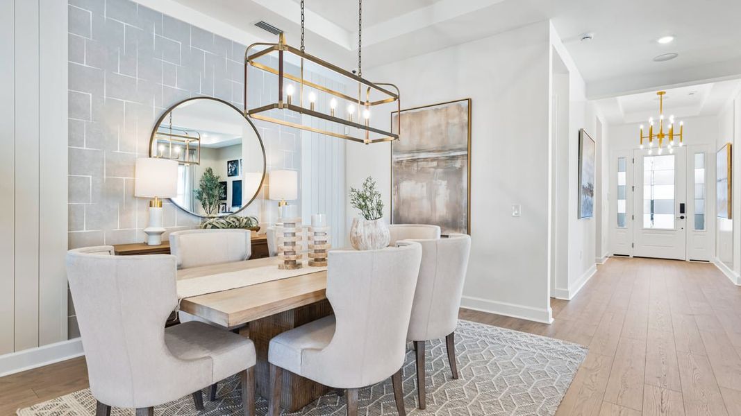 Furnished interior view inside a new home in Esplanade by the Islands, Naples (Image 12).