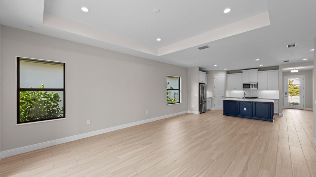 Spacious, unfurnished interior of a new home in SkySail, Naples (Image 13).