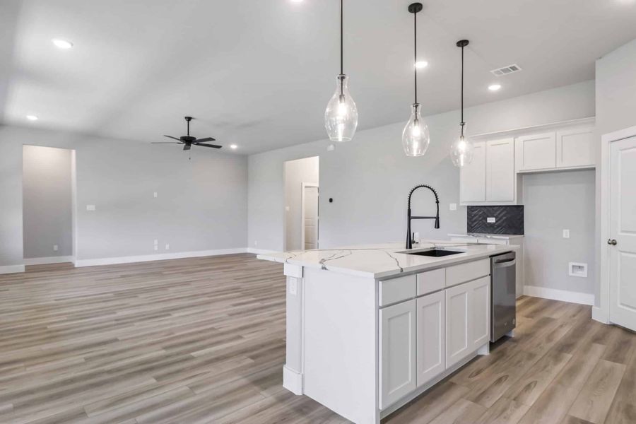 Representative furnished interior of a home built from the The Teton by Lillian Custom Homes in Polo Ridge, Heath (Image 17).