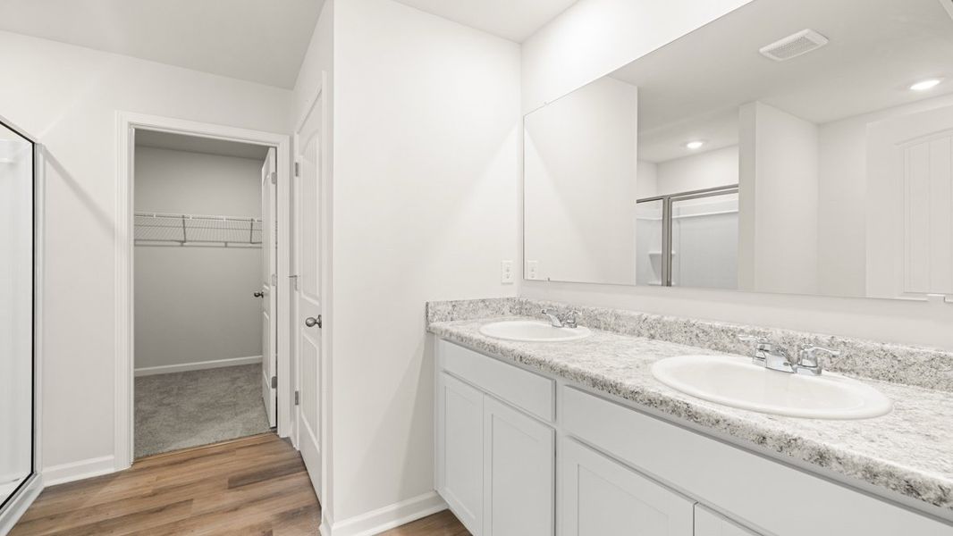 Representative furnished interior of a home built from the Penwell by D.R. Horton in Oakleigh Glen, Dallas (Image 7).