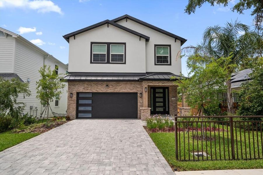Front exterior of a new home in , Dunedin, FL, highlighting curb appeal (Image 21). Front exterior of a new home in , Dunedin, FL, highlighting curb appeal (Image 21).
