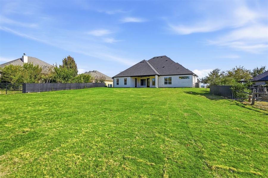 Exterior details and patio area of a home in , Granbury (Image 29).