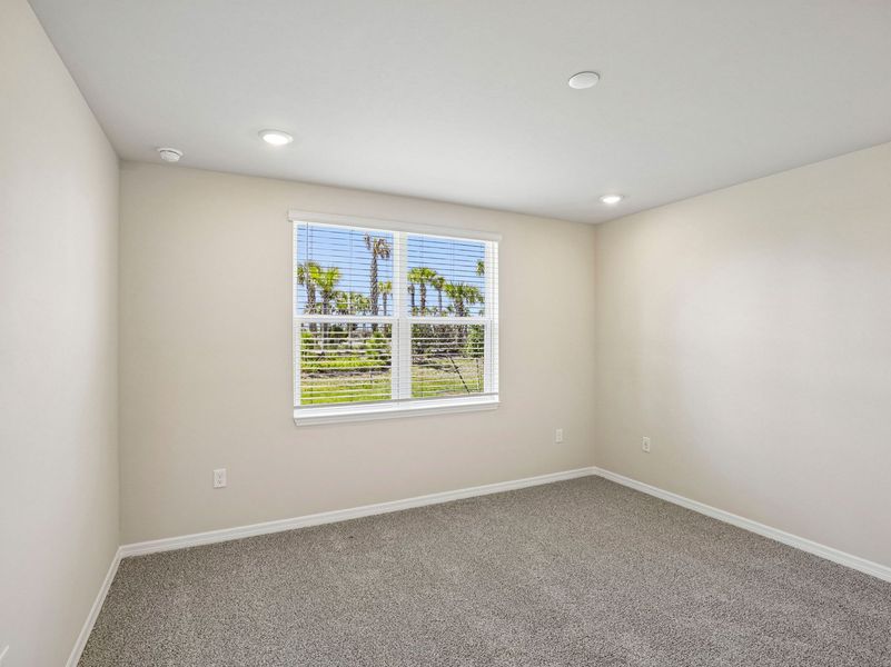 Spacious, unfurnished interior of a new home in Crescent Lakes - Premier Series, Punta Gorda (Image 14).