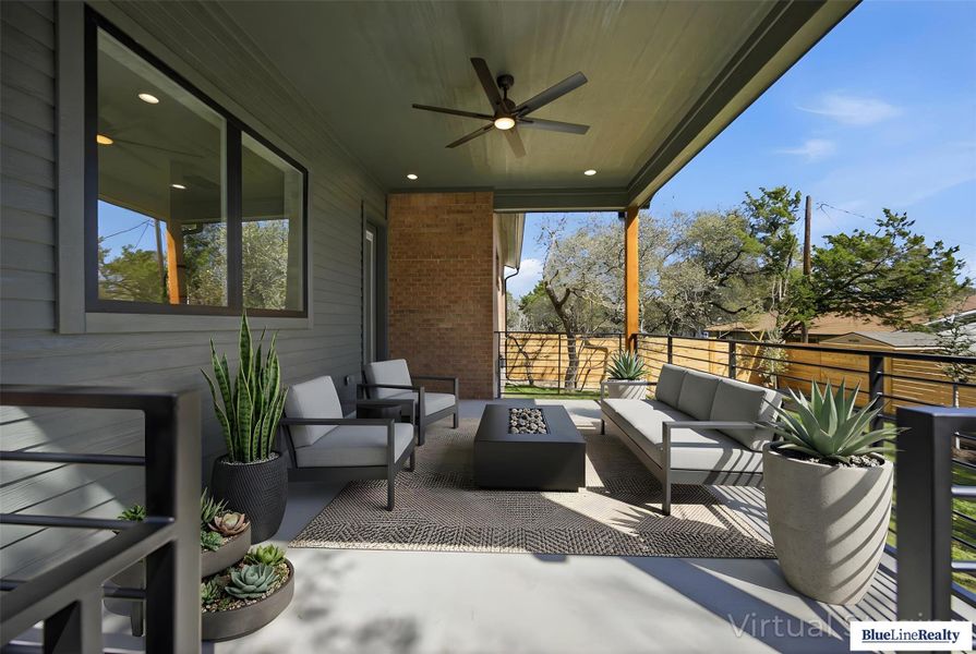 View of patio / terrace featuring an outdoor living space with a fire pit and a ceiling fan