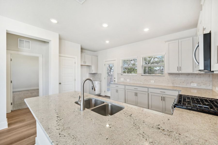 Kitchen in the Medina floorplan at a Meritage Homes community.