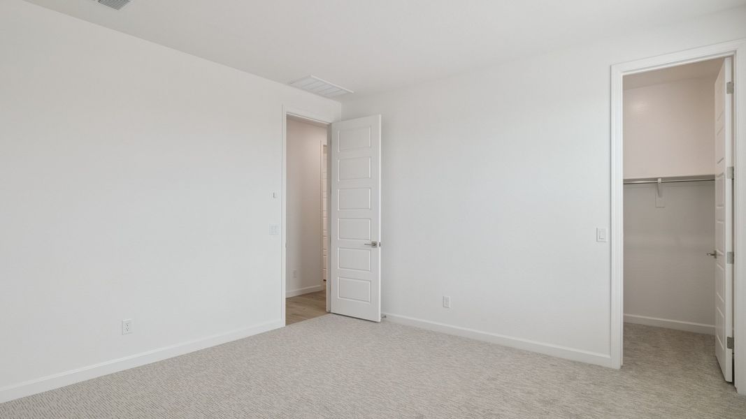 Spacious, unfurnished interior of a new home in Zanjero Pass, Waddell (Image 36). Spacious, unfurnished interior of a new home in Zanjero Pass, Waddell (Image 36).