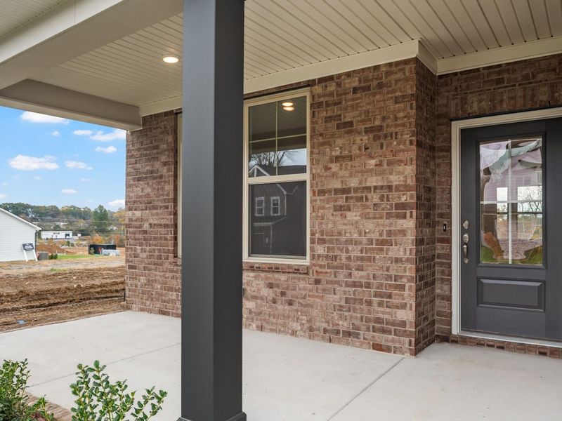 Exterior details and patio area of a home in Woods Crossing, Gallatin (Image 3).