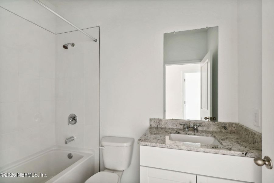 Furnished interior view inside a new home in Cypress Meadows - Signature Series, Jacksonville (Image 8).