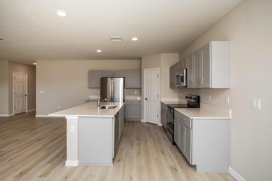 Furnished interior view inside a new home in Villa Mar, Winter Haven (Image 5).