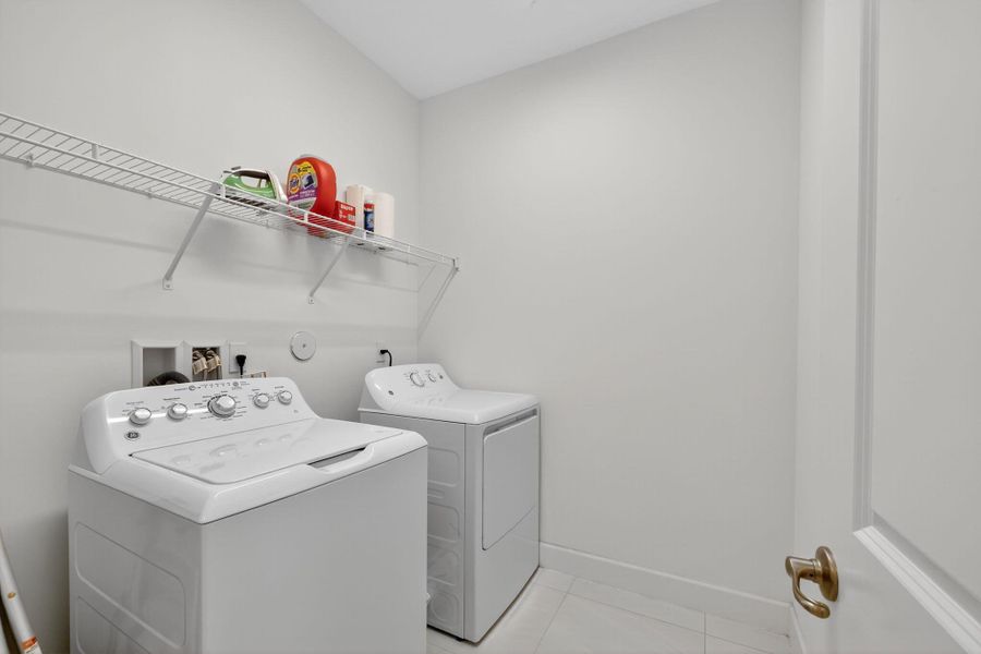 Furnished interior view inside a new home in , Port St. Lucie (Image 15).