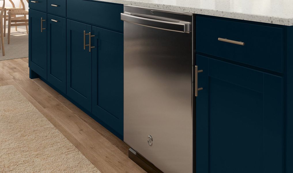 Kitchen with striking cabinets and stainless steel appliances