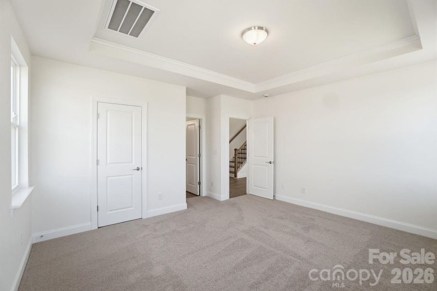 Primary Bedroom w/ tray ceiling
