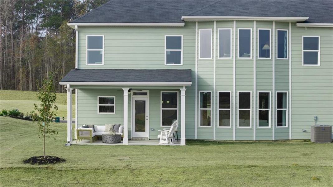Exterior details and patio area of a home in Evergreen Crossing, Locust Grove (Image 3). Exterior details and patio area of a home in Evergreen Crossing, Locust Grove (Image 3).