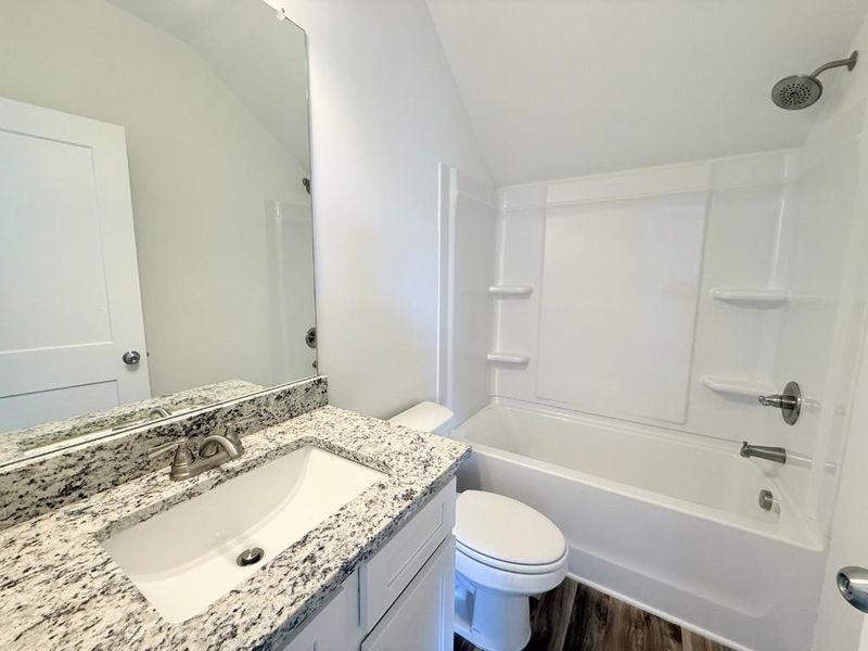 Furnished interior view inside a new home in Sutton's Landing, Statham (Image 13).