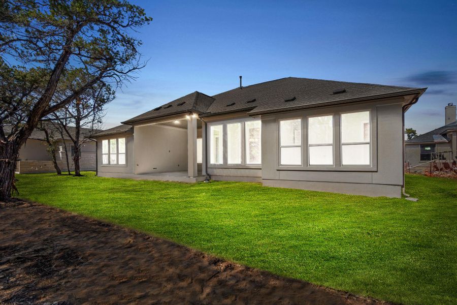 Rear of home and private back yard Rear of home and private back yard