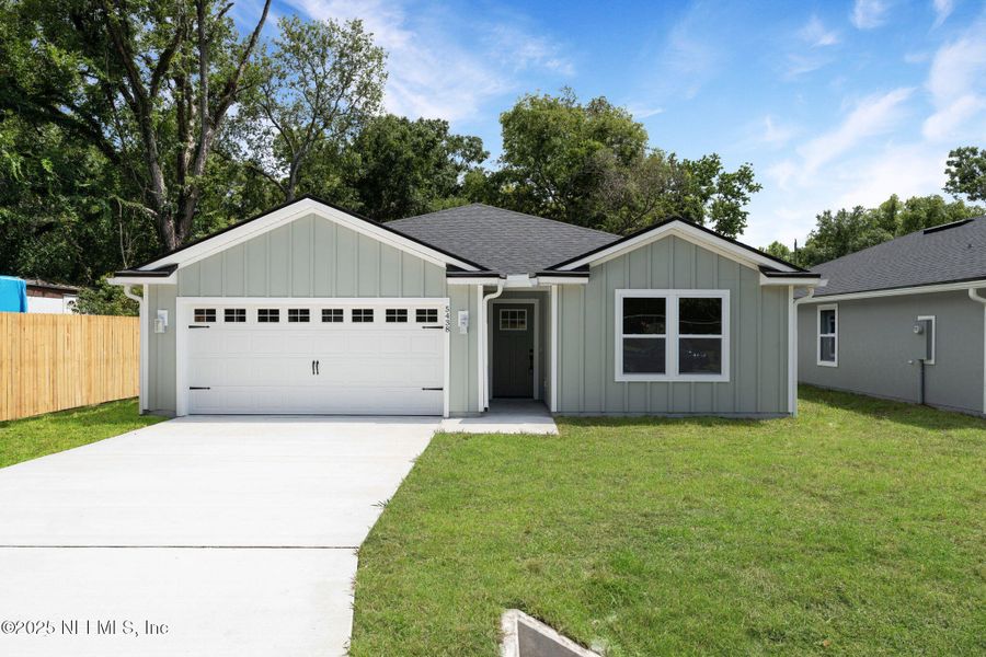 Front exterior of a new home in , Jacksonville, FL, highlighting curb appeal (Image 1). Front exterior of a new home in , Jacksonville, FL, highlighting curb appeal (Image 1).