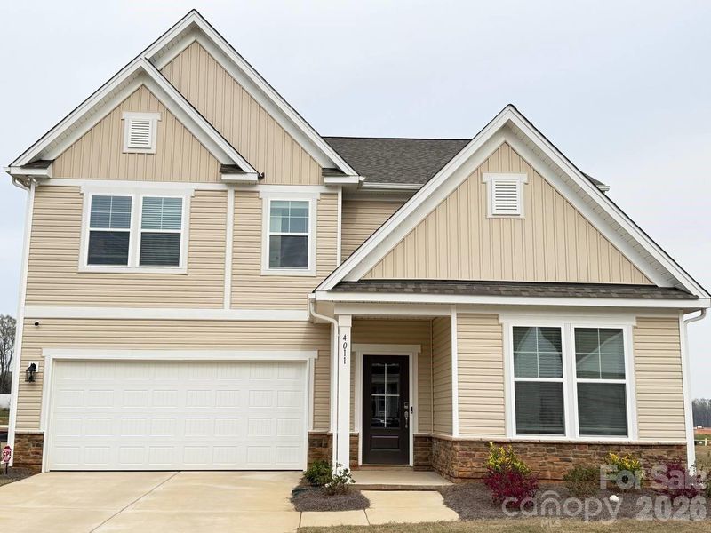 Front exterior of a new home in Clairmont, Charlotte, NC, highlighting curb appeal (Image 14). Front exterior of a new home in Clairmont, Charlotte, NC, highlighting curb appeal (Image 14).