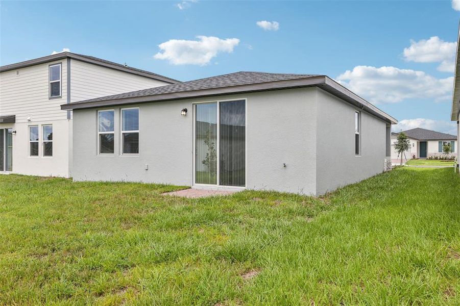 Exterior details and patio area of a home in Hamilton Bluff - Classic Series, Lake Hamilton (Image 26).