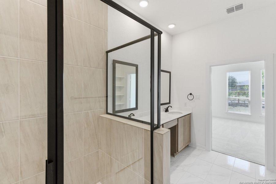 Furnished interior view inside a new home in The Crossvine – Garden Homes, Schertz (Image 8).