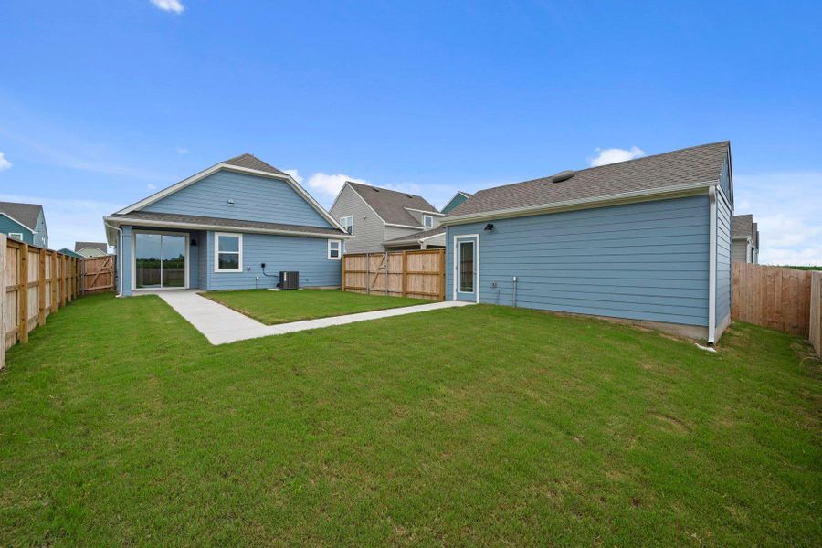 Rear of Home and Private Backyard