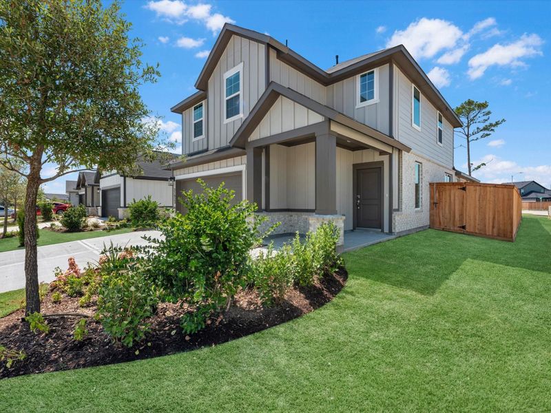 Front exterior of a new home in Mason Woods, Cypress, TX, highlighting curb appeal (Image 16).