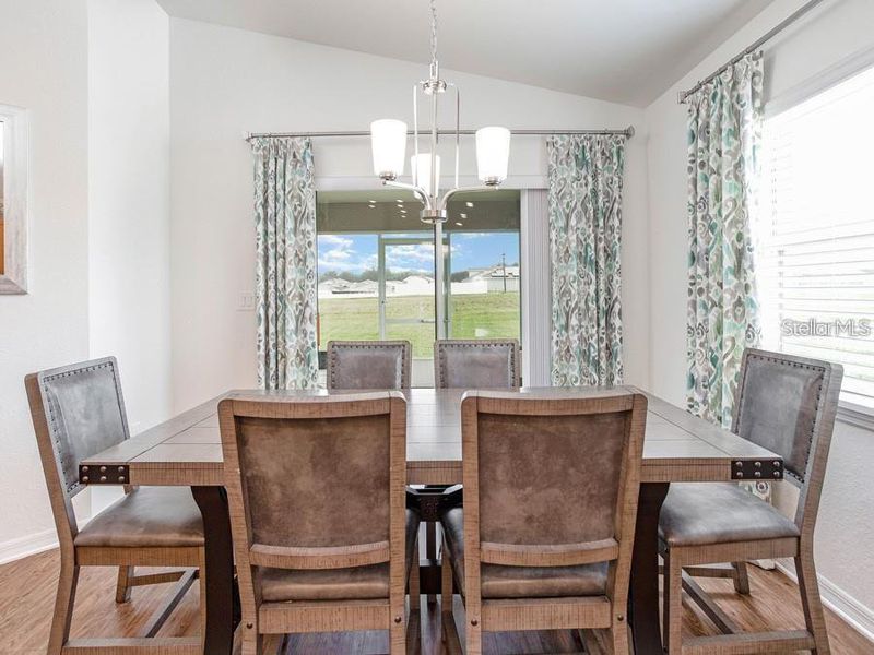 Furnished interior view inside a new home in Harbor at Lake Henry - Single-Family Homes, Winter Haven (Image 4).