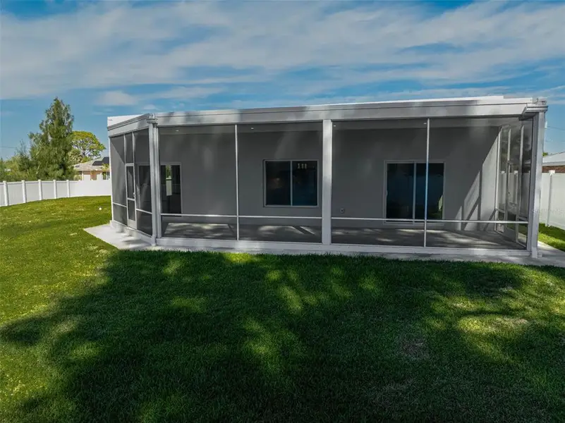 Exterior details and patio area of a home in , North Port (Image 4).