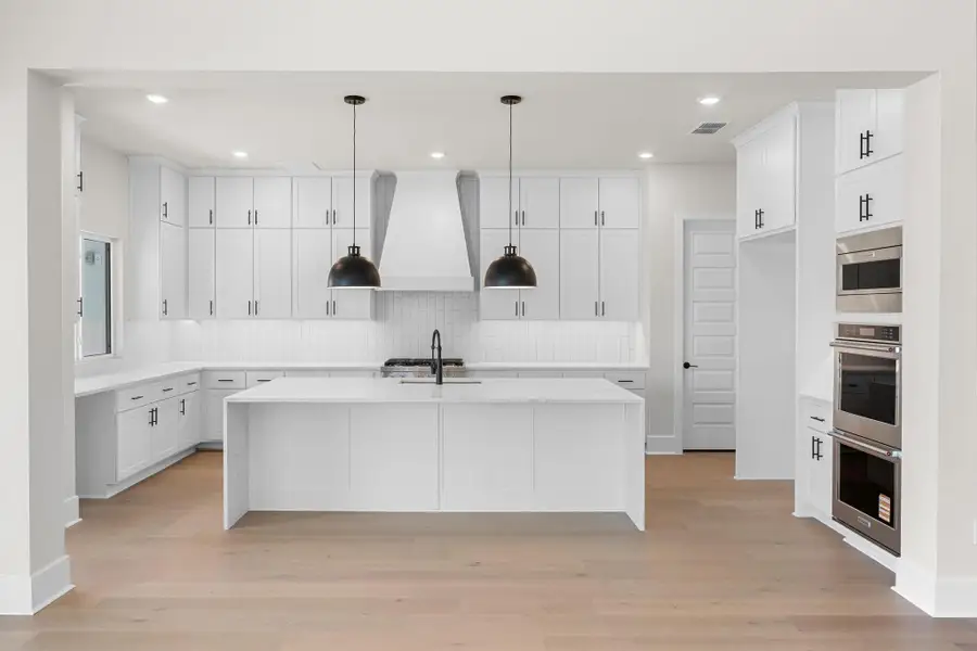 Furnished interior view inside a new home in Rough Hollow - Las Brisas, Austin (Image 8).