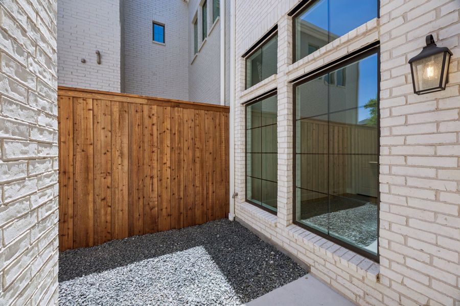 Representative exterior details of a home built from the Washington by Centre Living Homes in Newman Village Townhomes, Frisco (Image 19).