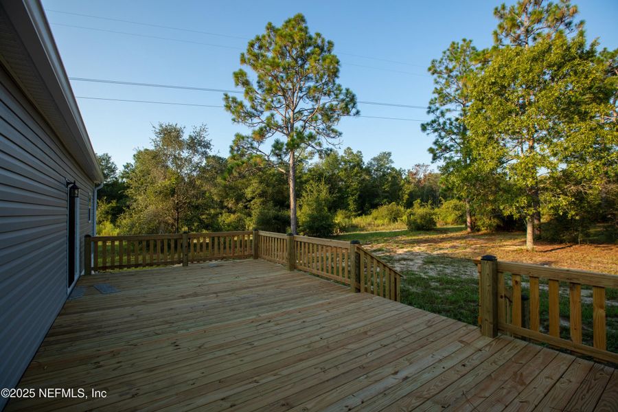 Front exterior of a new home in , Keystone Heights, FL, highlighting curb appeal (Image 22). Front exterior of a new home in , Keystone Heights, FL, highlighting curb appeal (Image 22).