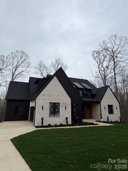 Front exterior of a new home in , Mount Ulla, NC, highlighting curb appeal (Image 23).