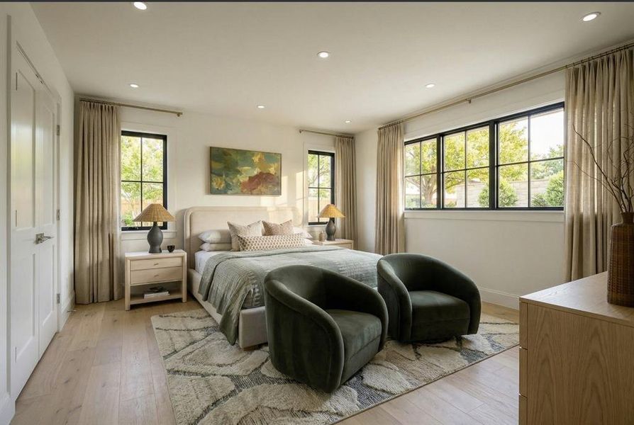 Bright interior featuring wood-finish flooring, recessed lighting, and expansive windows