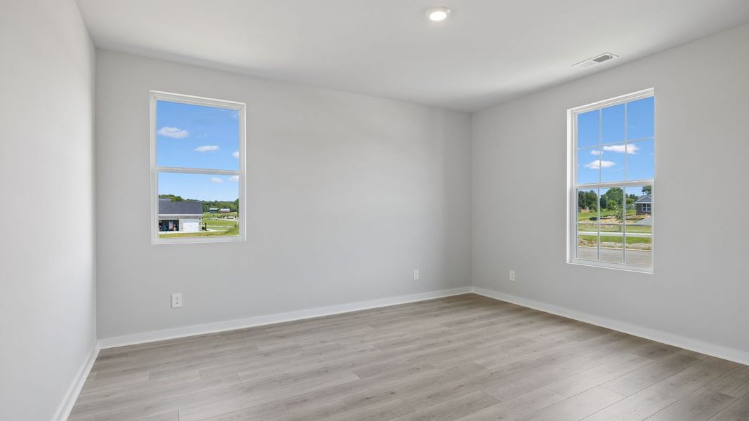 Representative unfurnished interior of a home built from the Ansley by D.R. Horton in Harvest Point, Spring Hill (Image 30).