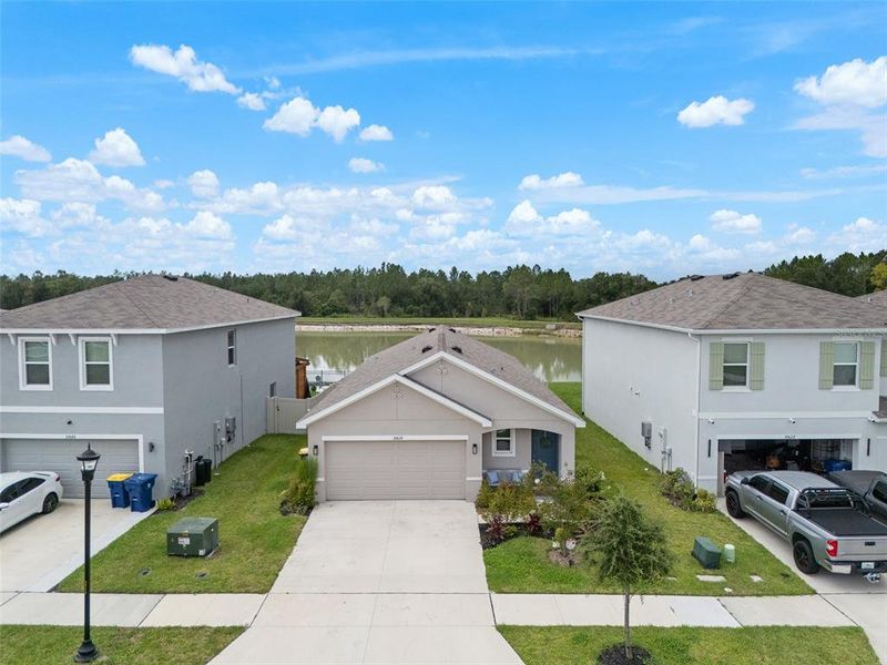 Front exterior of a new home in Northwater at Two Rivers, Zephyrhills, FL, highlighting curb appeal (Image 25).