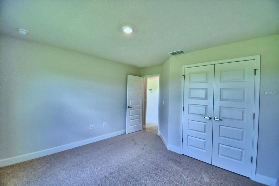 Spacious, unfurnished interior of a new home in Cadence Crossing, Auburndale (Image 19).