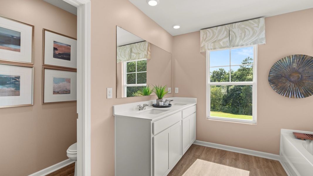 Representative furnished interior of a home built from the Halton by D.R. Horton in Brooks Station, Dacula (Image 38).