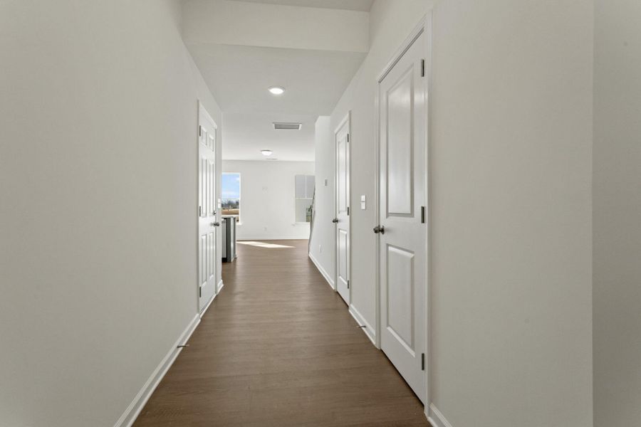 Spacious, unfurnished interior of a new home in Bellevue Townhomes, Greenville (Image 10). Spacious, unfurnished interior of a new home in Bellevue Townhomes, Greenville (Image 10).