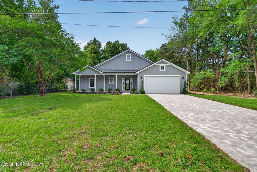 Front exterior of a new home in , Macclenny, FL, highlighting curb appeal (Image 26).