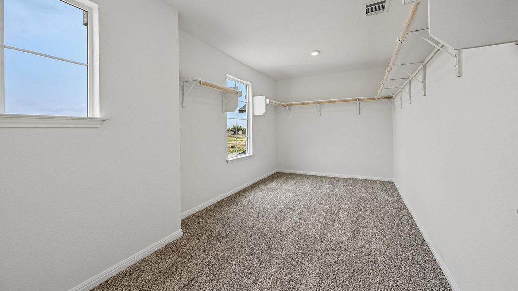 Spacious, unfurnished interior of a new home in Bar W Ranch, Leander (Image 33).