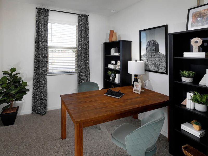 Utilize one of the secondary bedrooms as a dedicated office space.