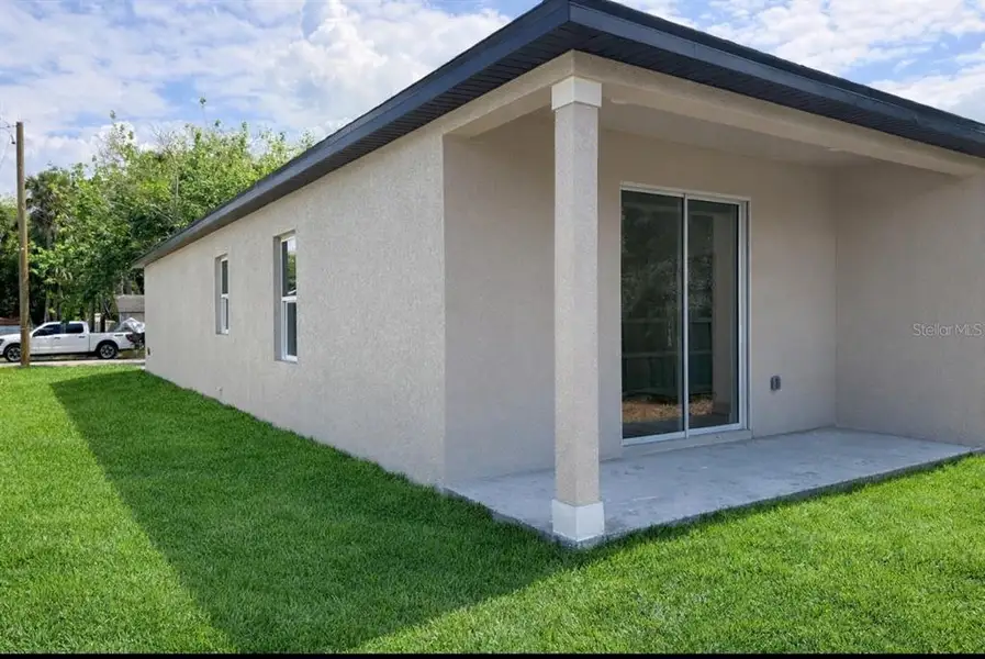 Exterior details and patio area of a home in , Sanford (Image 3). Exterior details and patio area of a home in , Sanford (Image 3).