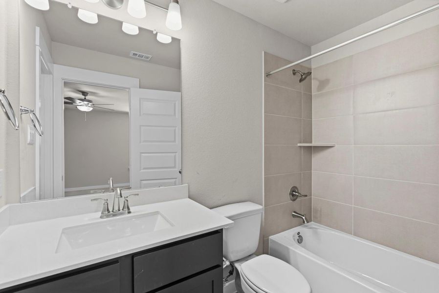 Furnished interior view inside a new home in Trinity Grove, Spring (Image 8).