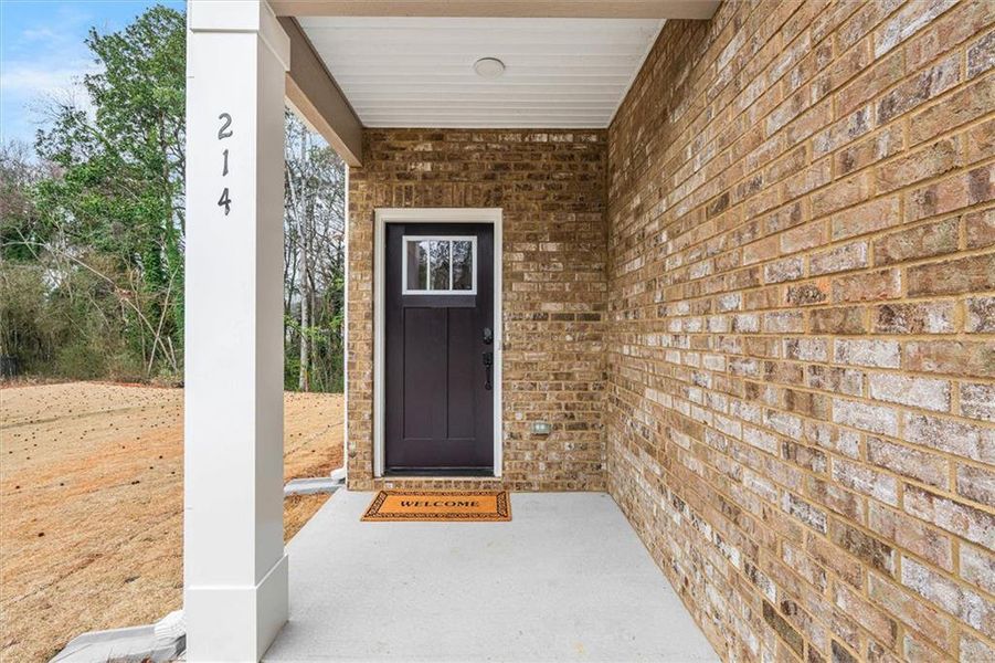 Exterior details and patio area of a home in Canterbury Villas, Carrollton (Image 22).