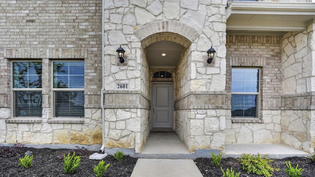 Exterior details and patio area of a home in Magnolia at Legacy Hills, Celina (Image 3). Exterior details and patio area of a home in Magnolia at Legacy Hills, Celina (Image 3).