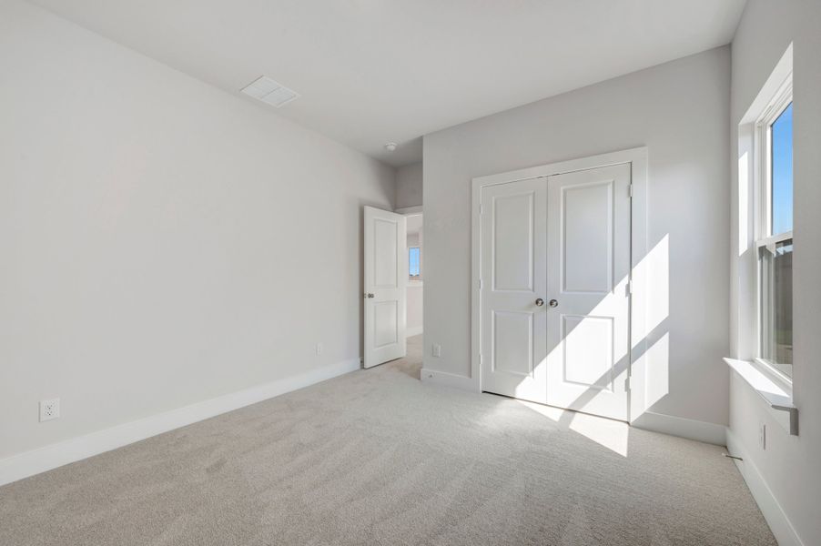Spacious, unfurnished interior of a new home in The Meadows, Denton (Image 26).