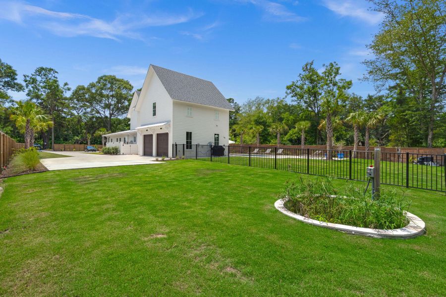 Front exterior of a new home in , Johns Island, SC, highlighting curb appeal (Image 27).