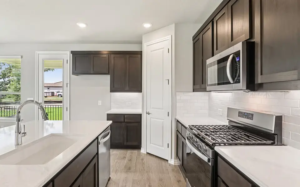 Furnished interior view inside a new home in Cottage at Kissing Tree, San Marcos (Image 5).