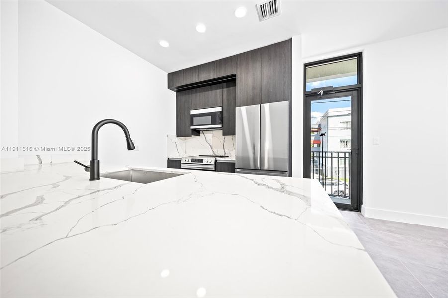 Furnished interior view inside a new home in , Miami (Image 14). Furnished interior view inside a new home in , Miami (Image 14).