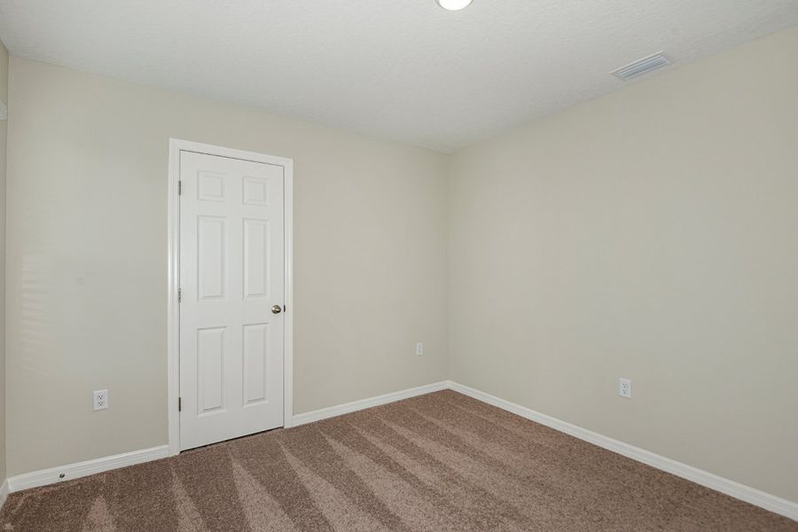 Spacious, unfurnished interior of a new home in Scenic Terrace, Haines City (Image 20).